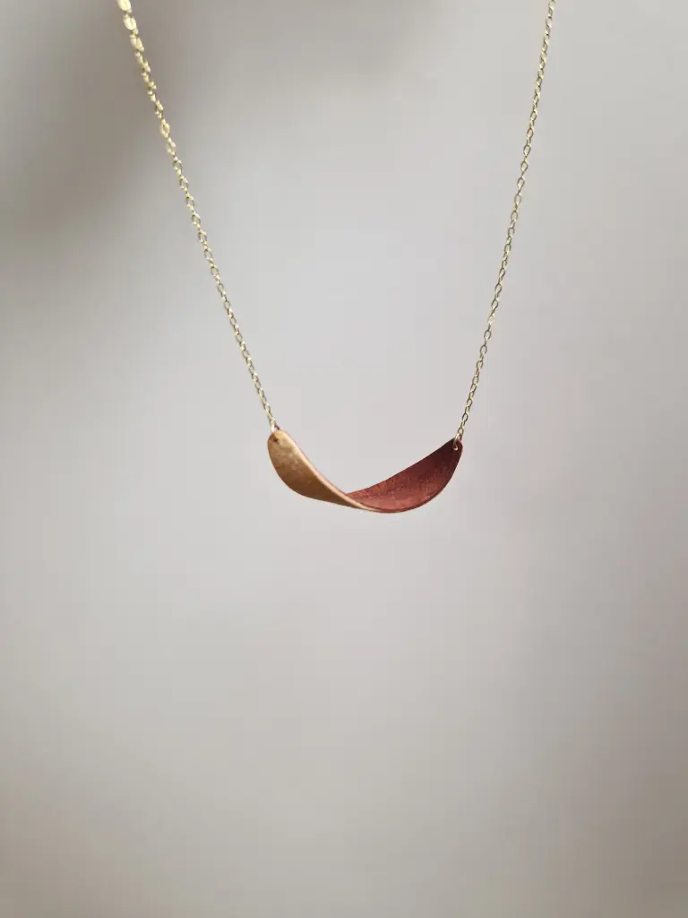 Pendentif placage enroulé